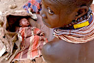 Kundama Farm, a Duss tribal farming community, 2-day-old Karo baby with its mother